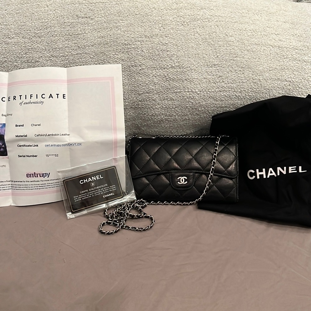 Authentic Chanel black lambskin wallet on chain